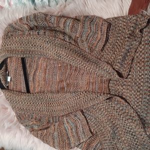 A knitch above cardigan size medium